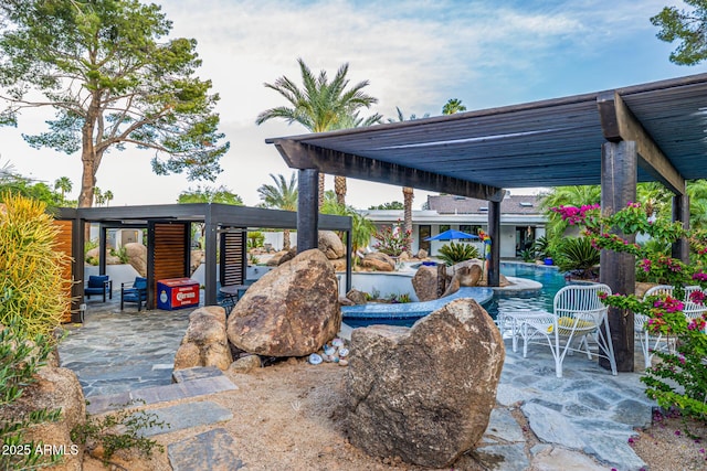 view of patio featuring an outdoor pool
