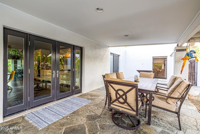 view of patio with french doors and outdoor dining area