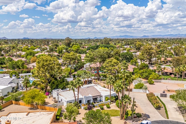 aerial perspective of suburban area with a mountainous background