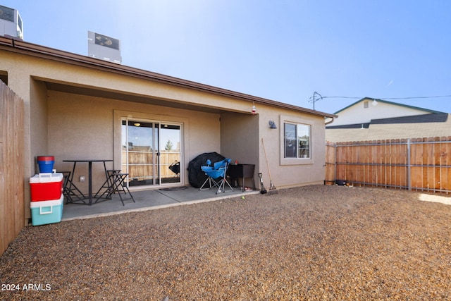 rear view of house with a patio area