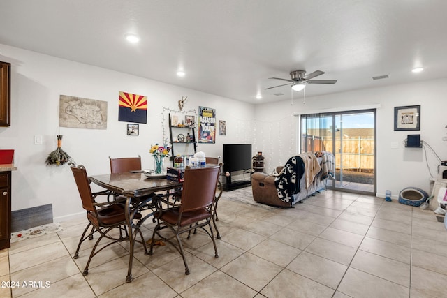 dining room featuring ceiling fan and light tile patterned floors