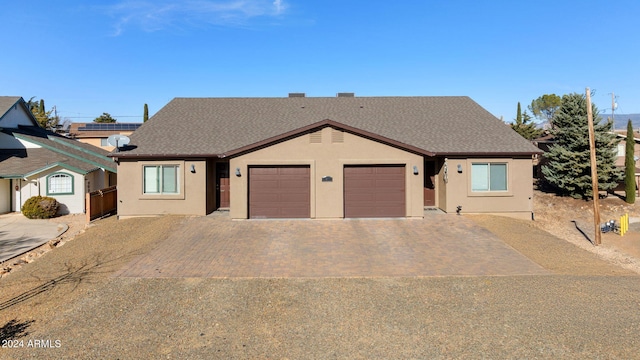 view of front of house with a garage