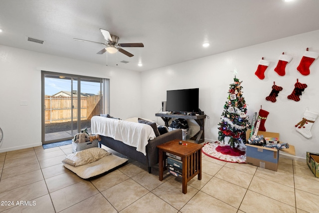 bedroom with light tile patterned floors, access to outside, and ceiling fan