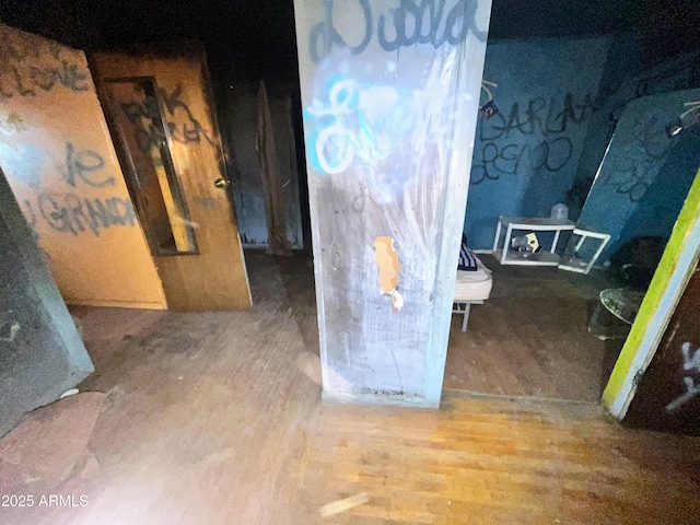 hall featuring wood finished floors