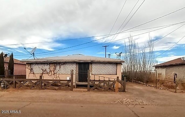 view of patio featuring fence