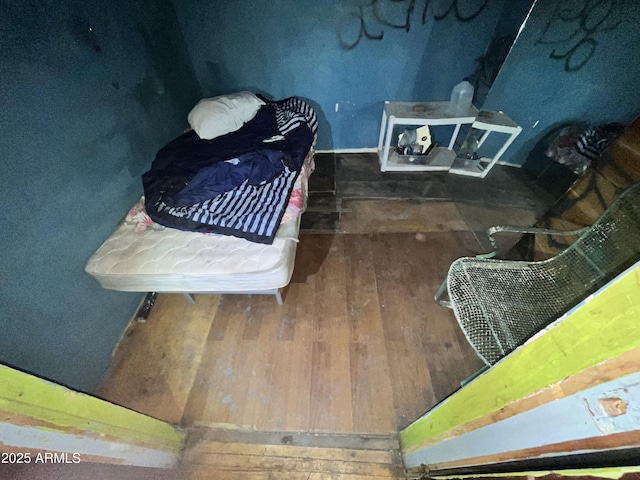 bedroom featuring hardwood / wood-style flooring