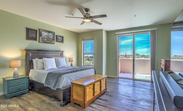 bedroom with access to outside, dark hardwood / wood-style floors, and ceiling fan