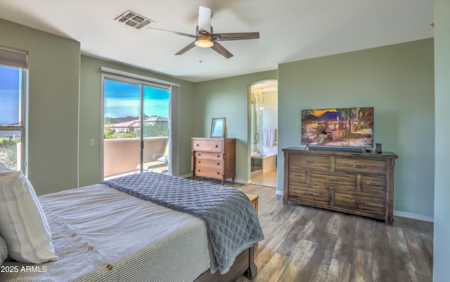 bedroom featuring ensuite bathroom, access to outside, ceiling fan, and dark hardwood / wood-style flooring