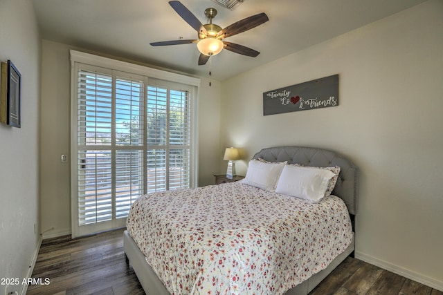 bedroom featuring ceiling fan and dark hardwood / wood-style flooring