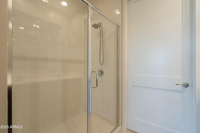 full bath featuring a stall shower