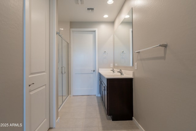 full bathroom with recessed lighting, tile patterned flooring, vanity, visible vents, and a stall shower