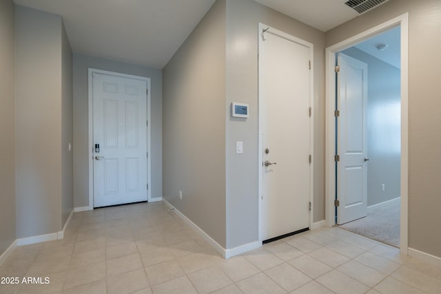 interior space with visible vents and baseboards