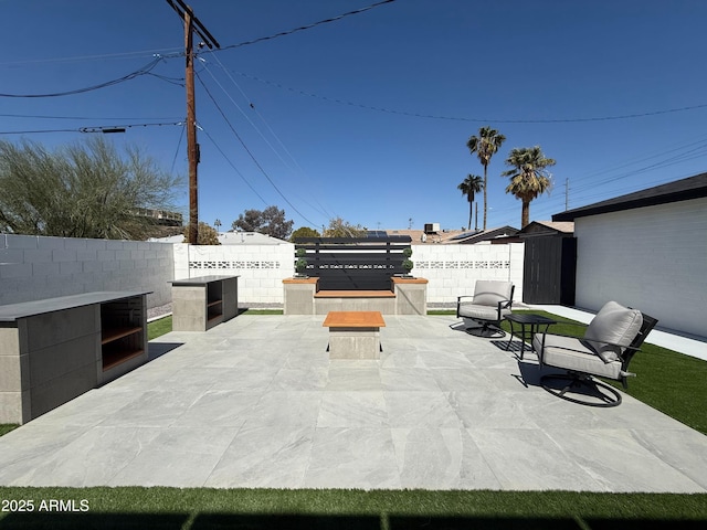 view of patio with a fenced backyard