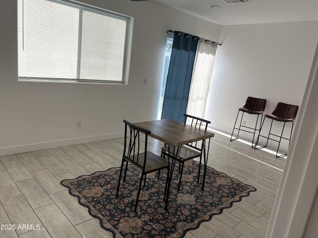 4602 N 47th Ave N, Phoenix, AZ 85031 - dining area with wood tiled floors and baseboards