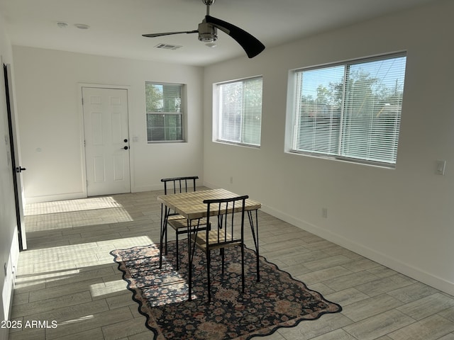4602 N 47th Ave N, Phoenix, AZ 85031 - dining room with ceiling fan, light wood-style floors, and baseboards