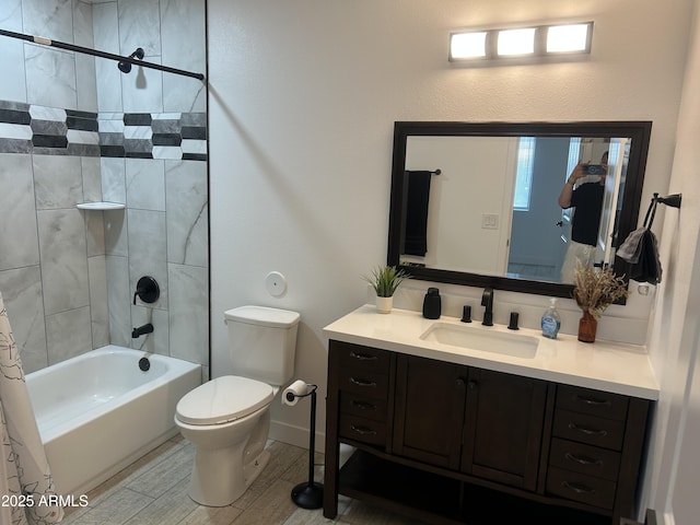 4602 N 47th Ave N, Phoenix, AZ 85031 - full bathroom featuring toilet, vanity, and shower / washtub combination