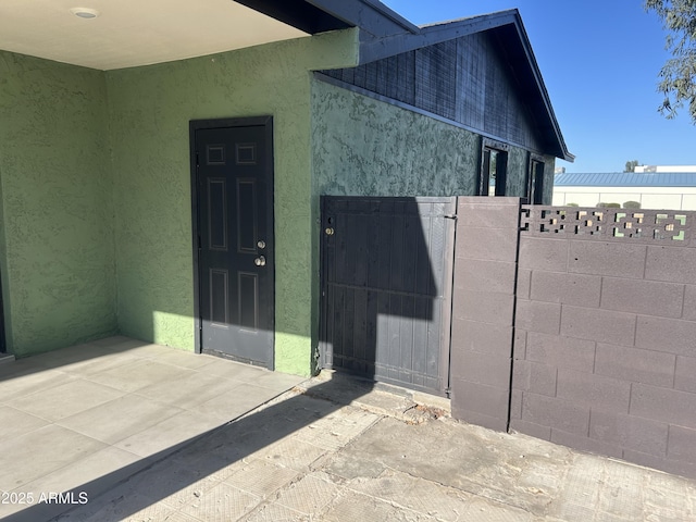 4602 N 47th Ave N, Phoenix, AZ 85031 - entrance to property featuring a gate, stucco siding, and fence