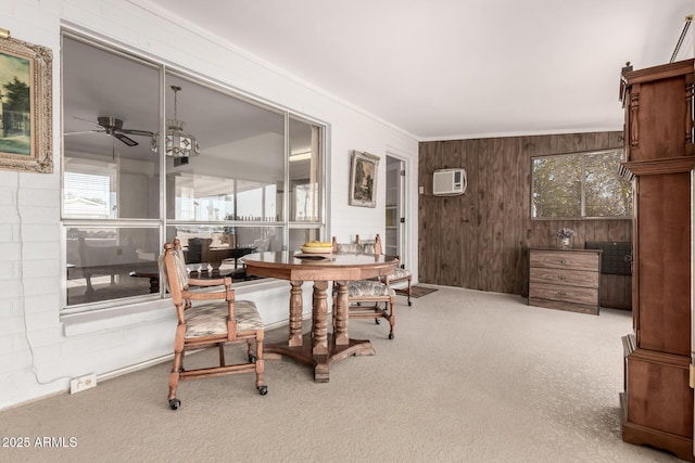 interior space featuring crown molding and ceiling fan