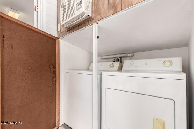 washroom featuring laundry area and independent washer and dryer