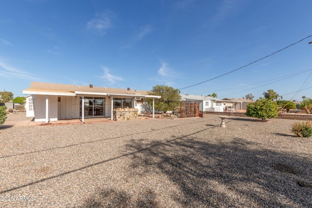 rear view of house with a patio