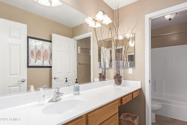 full bathroom with toilet, tub / shower combination, vanity, and tile patterned floors