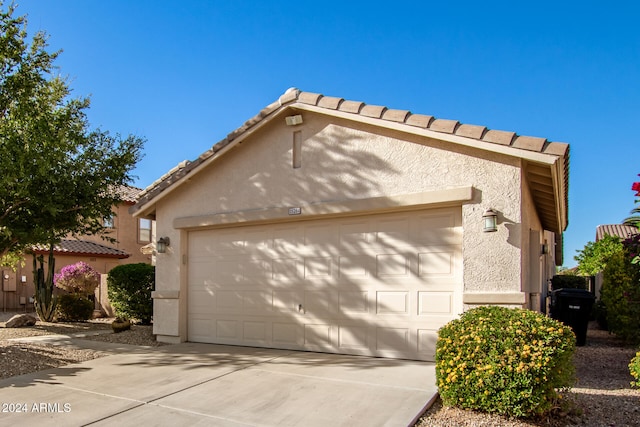 view of home's exterior with a garage