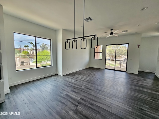 1401 S Rita Ln, Tempe, AZ 85281 - unfurnished dining area with dark wood finished floors and ceiling fan