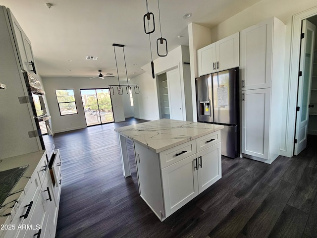 1401 S Rita Ln, Tempe, AZ 85281 - kitchen featuring stainless steel refrigerator with ice dispenser, dark wood finished floors, light stone countertops, ceiling fan, and recessed lighting