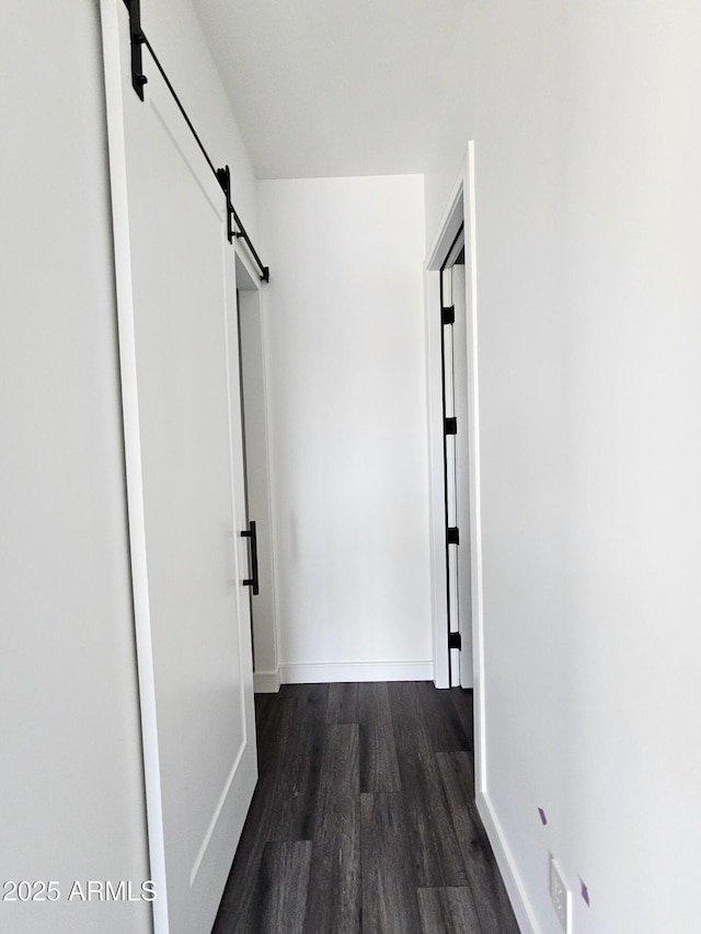 1401 S Rita Ln, Tempe, AZ 85281 - hallway featuring a barn door and dark wood finished floors