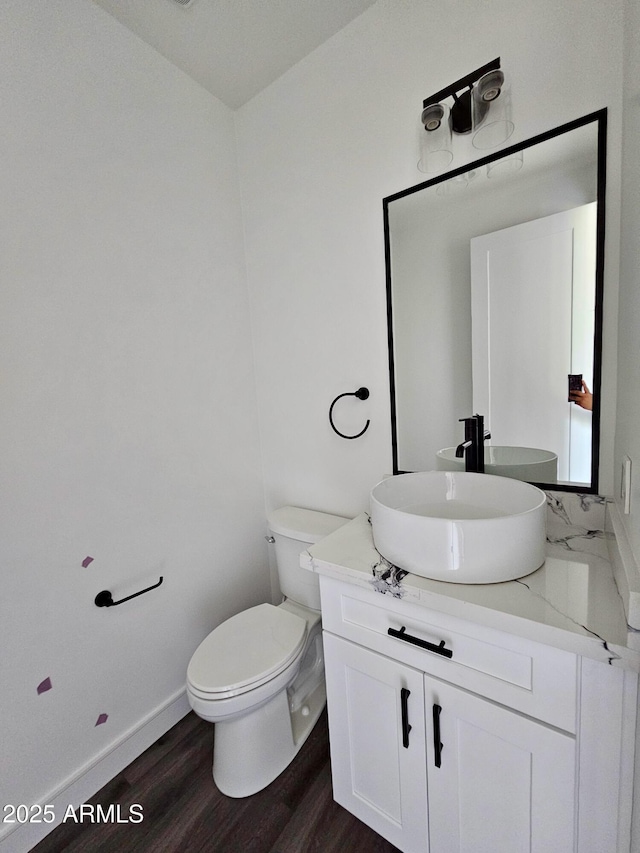 1401 S Rita Ln, Tempe, AZ 85281 - bathroom with vanity and wood finished floors