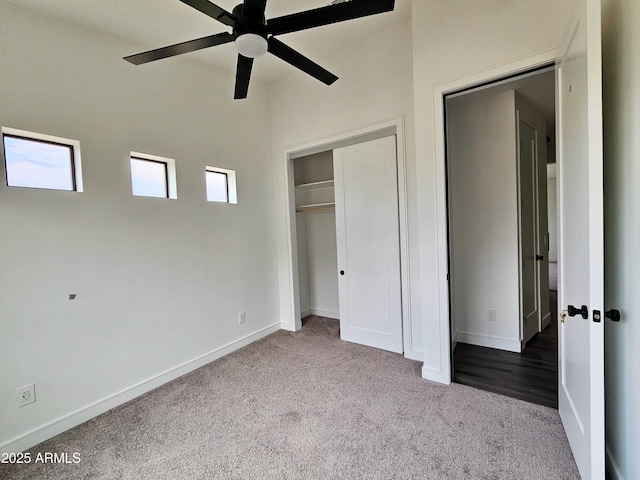 1401 S Rita Ln, Tempe, AZ 85281 - unfurnished bedroom with carpet, a closet, and a ceiling fan