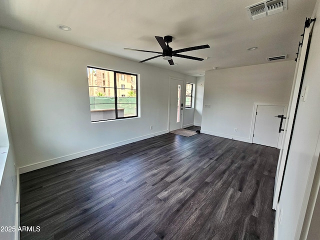 1401 S Rita Ln, Tempe, AZ 85281 - spare room featuring dark wood-style floors, a ceiling fan, and recessed lighting