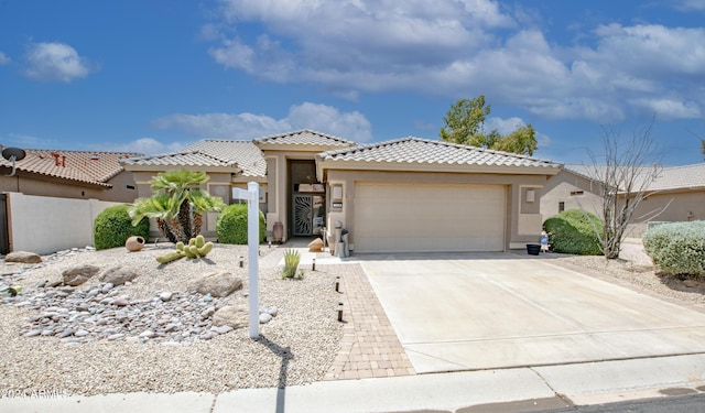 view of front of home with a garage