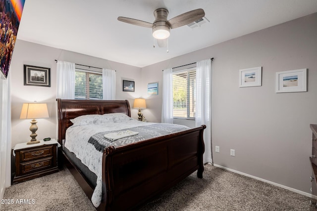 7738 N 185th Ave, Waddell, AZ 85355 - bedroom with baseboards, visible vents, multiple windows, and carpet