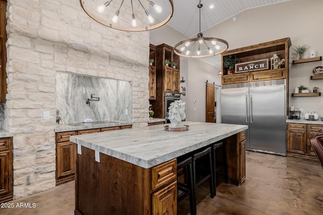 7738 N 185th Ave, Waddell, AZ 85355 - kitchen with an inviting chandelier, open shelves, concrete floors, and stainless steel appliances