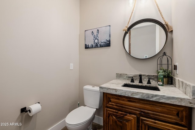 7738 N 185th Ave, Waddell, AZ 85355 - bathroom featuring toilet, baseboards, and vanity