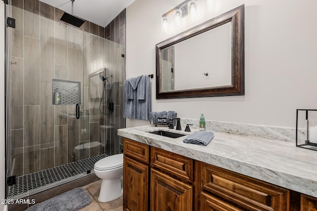 7738 N 185th Ave, Waddell, AZ 85355 - full bathroom featuring vanity, tile patterned flooring, toilet, and a shower stall
