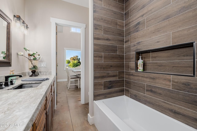 7738 N 185th Ave, Waddell, AZ 85355 - full bathroom featuring a washtub, baseboards, and vanity
