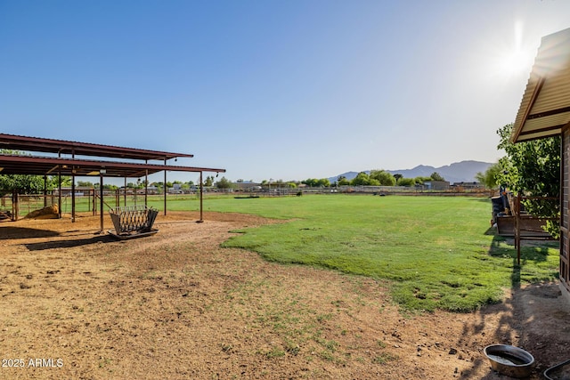 7738 N 185th Ave, Waddell, AZ 85355 - view of yard featuring fence, a mountain view, and a rural view