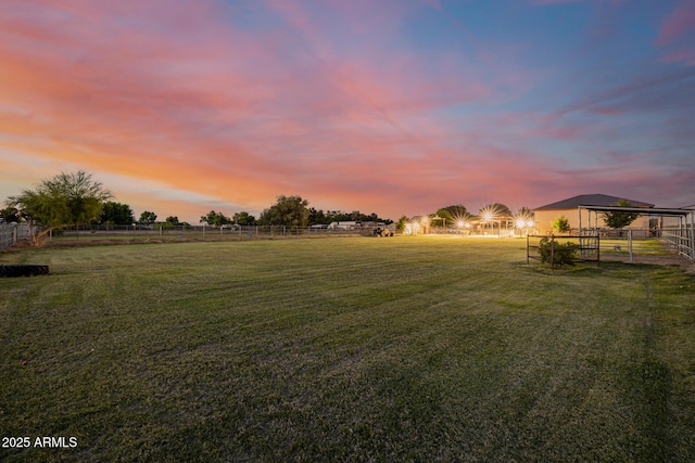 7738 N 185th Ave, Waddell, AZ 85355 - yard at dusk with fence