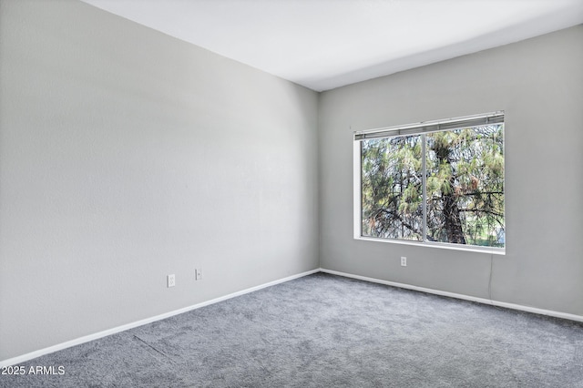 1017 E Maryland Ave Unit 236, Phoenix, AZ 85014 - unfurnished room featuring baseboards and carpet floors