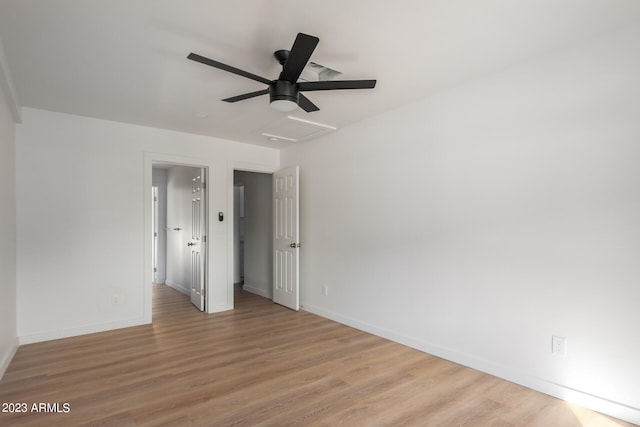 unfurnished bedroom featuring light hardwood / wood-style floors and ceiling fan