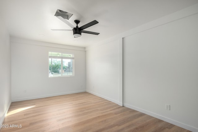 unfurnished room featuring light hardwood / wood-style floors and ceiling fan