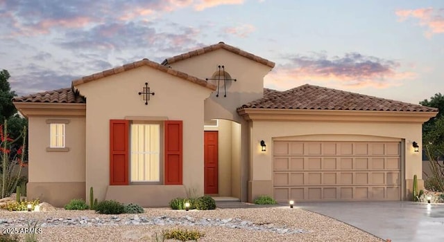 279 S 163rd Dr, Goodyear, AZ 85338 - mediterranean / spanish home featuring a garage, driveway, stucco siding, and a tile roof