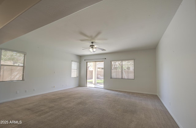 6192 S Claiborne Ave, Gilbert, AZ 85298 - spare room with baseboards, a ceiling fan, light carpet, and a healthy amount of sunlight