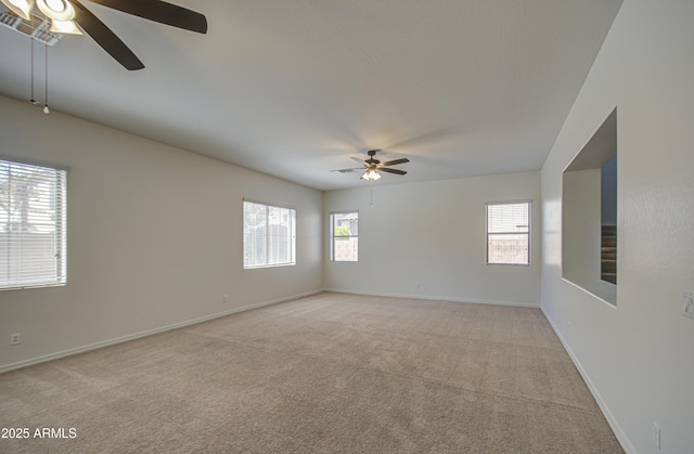 6192 S Claiborne Ave, Gilbert, AZ 85298 - empty room featuring baseboards, light colored carpet, and a ceiling fan