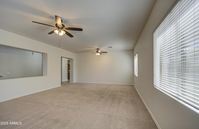 6192 S Claiborne Ave, Gilbert, AZ 85298 - spare room with light colored carpet, baseboards, and ceiling fan