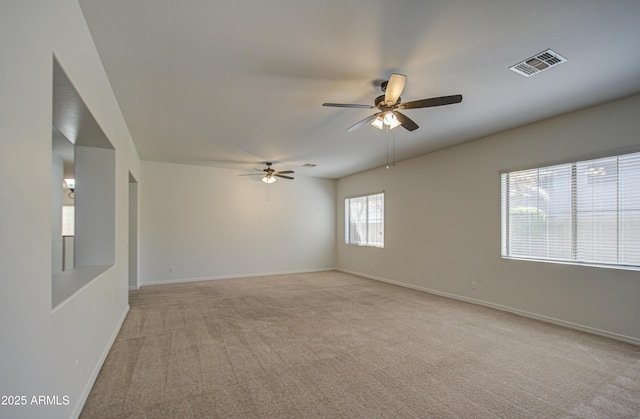6192 S Claiborne Ave, Gilbert, AZ 85298 - empty room featuring visible vents, baseboards, a ceiling fan, and light carpet