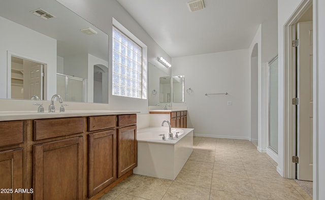 6192 S Claiborne Ave, Gilbert, AZ 85298 - full bath featuring tile patterned flooring, visible vents, a sink, and a stall shower