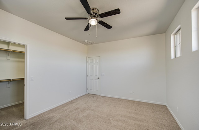 6192 S Claiborne Ave, Gilbert, AZ 85298 - unfurnished bedroom with carpet flooring, baseboards, and a walk in closet